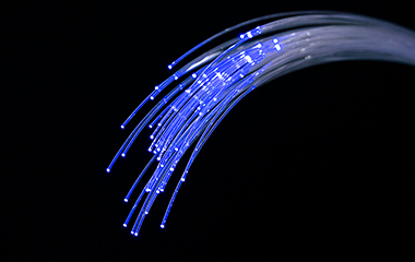 Bundled and covered optical fiber light guides